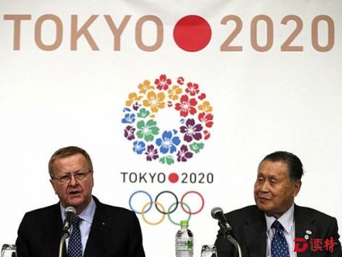 资料：日本奥组委主席森喜朗（右）与国际奥委会副主席约翰·科茨出席新闻会。