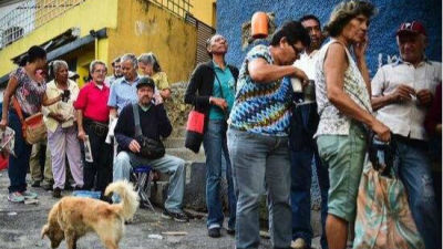 外媒：委内瑞拉发生哄抢事件 华人商铺遭波及