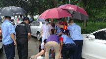 雨中撑起“艳阳天” 网格员合力救孕妇