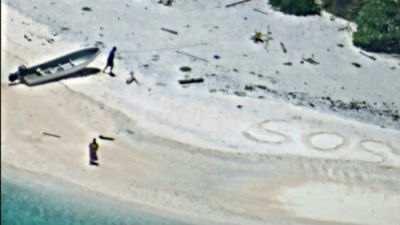 现实版荒岛求生 美国夫妻沙滩上写巨幅SOS获救