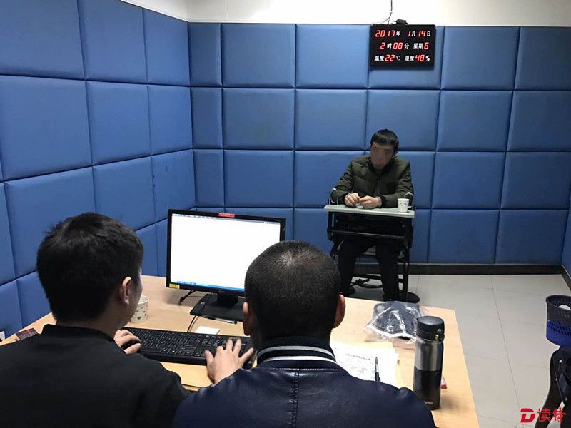 民警连夜突审谭某