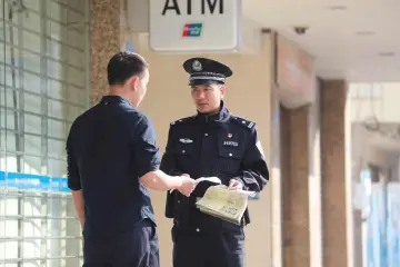 屈飞平：光明塘尾社区的“管事人”