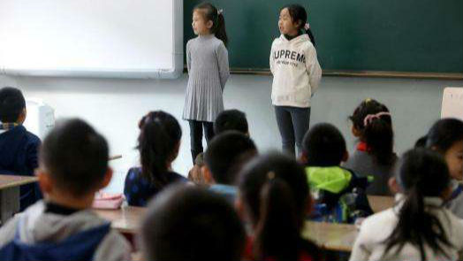 今年将制订以居住证为准的随迁子女就学政策