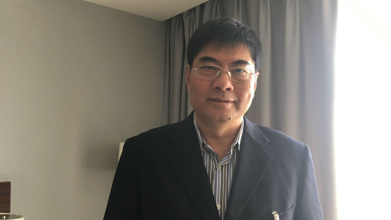梁志敏:“老委员”履职20年热情不减当年