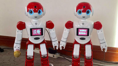 读特新闻机器人成两会小明星 央媒闻讯采访！
