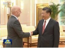 习近平会见国际足联主席:中国同国际足联合作前景广阔 