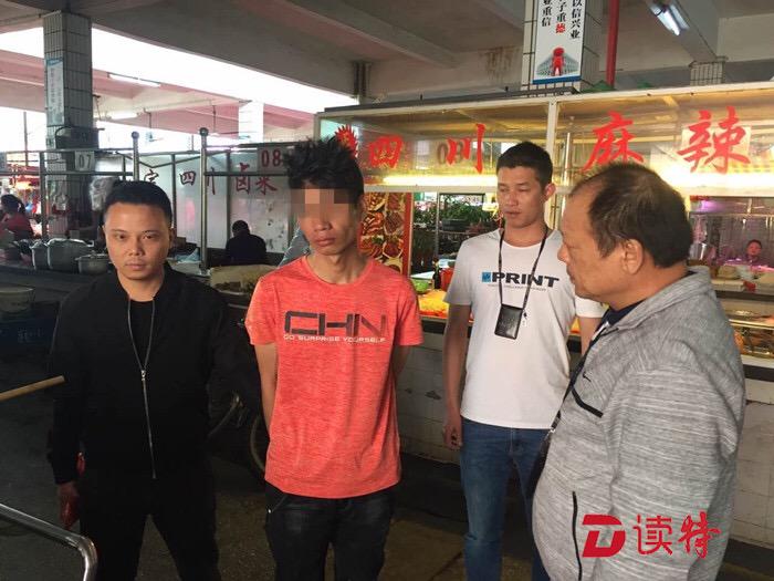 正能量！男子菜场扒窃 群众合力擒贼