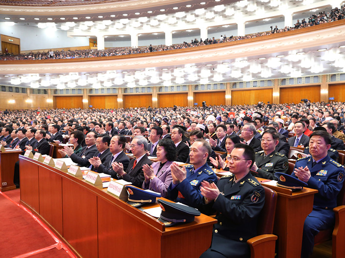 国际社会关注全国人大通过宪法修正案