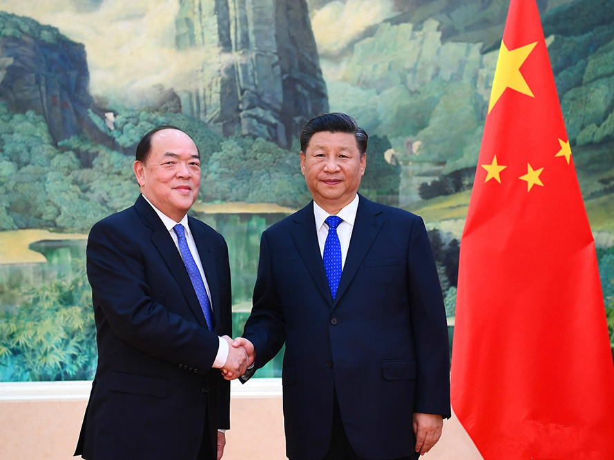 习近平会见贺一诚