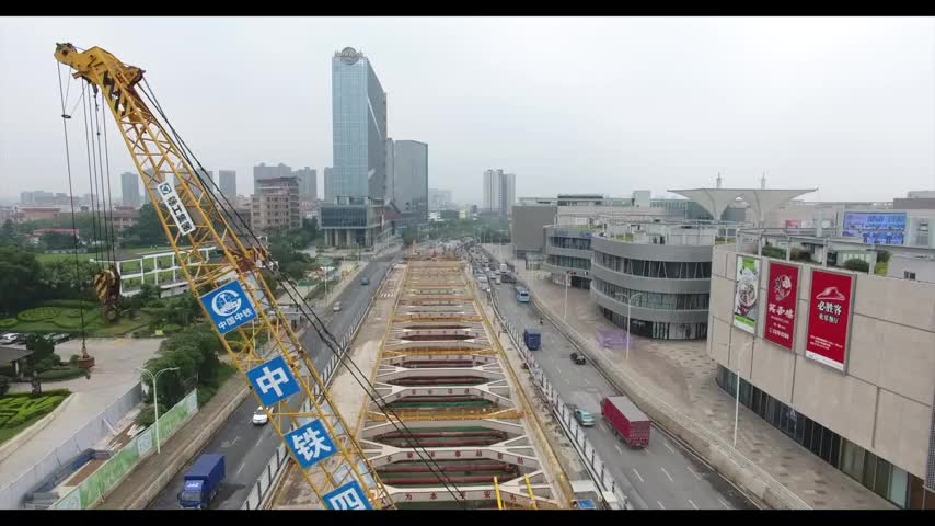 深圳地铁4号线三期工程施工地传来嘹亮歌声，他们这样表白祖国
