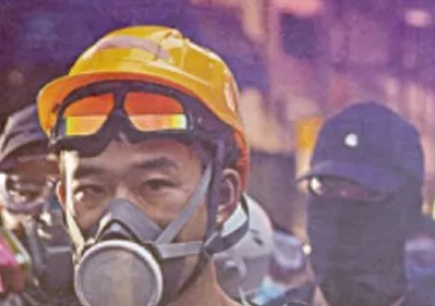 起底黑衣暴徒：人前“无大台”，幕后“正规军”
