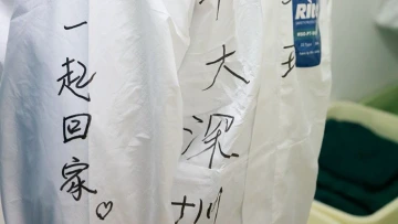 定格：那双眼，那个背影，那些字里的希望