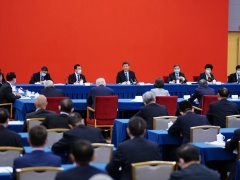 人民日报评论员：在危机中育新机 于变局中开新局