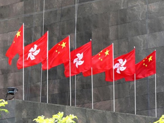 全国人大涉港决定确保“一国两制”不变形不走样