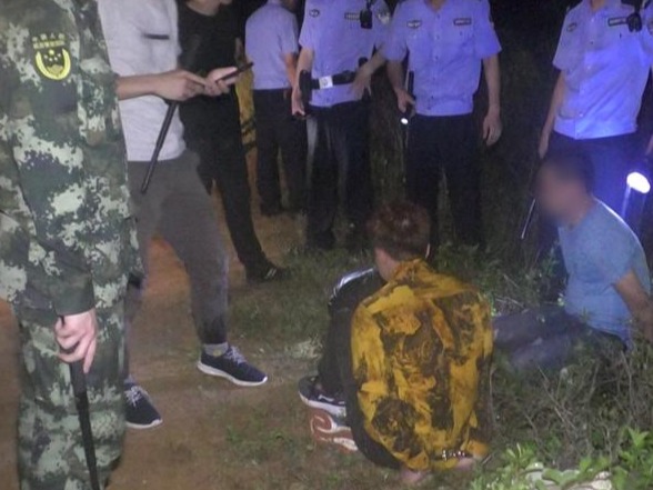 广东海警成功破获一起海上跨境偷渡案 抓获涉案嫌疑人20名