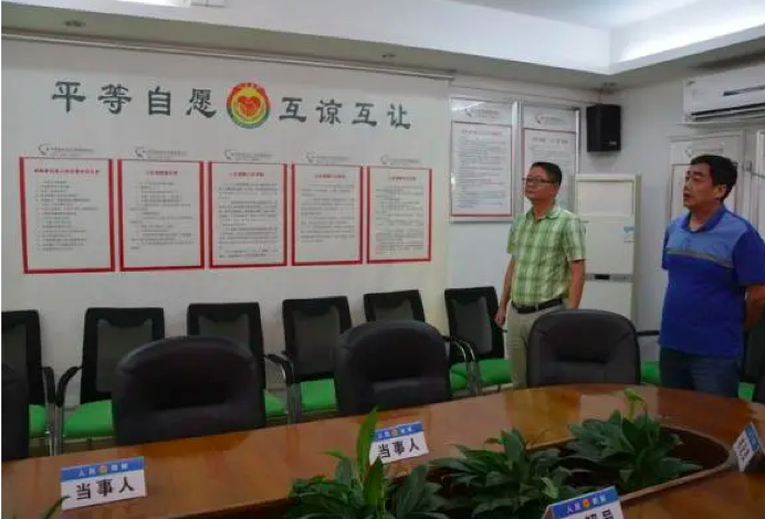 阵地前移至花园小区!横岗这个社区有个“卷帘式”调解室