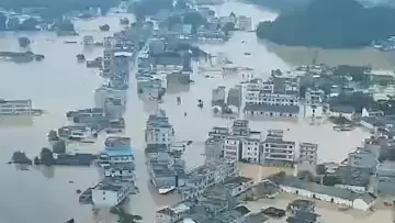 两千余名江洲青壮年专程返乡抗洪