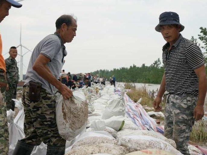 可用劳动力不足千人，发信求援的九江江洲已有游子回乡抗洪
