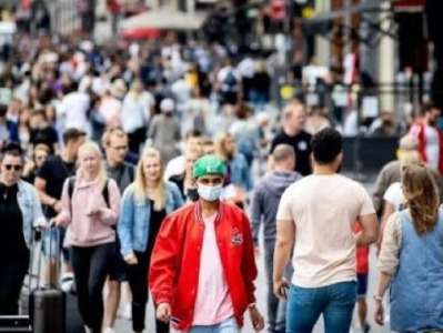 荷兰首相宣布“局部封城”，首次提出强制佩戴口罩
