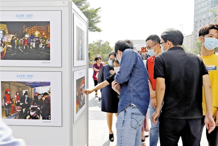 玉塘举行“抗击疫情，与爱同行”摄影作品展