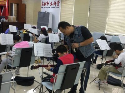 新庄社区吉他培训让青少年乐享生活
