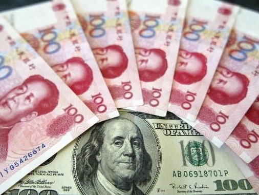 继续走低，人民币对美元即期汇率一度逼近6.58关口