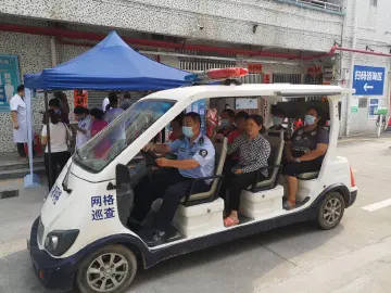 玉塘网格员变身“司机”接送菜农打疫苗