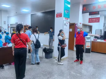 薯田埔社区党员夫妻档“义”路抗疫并肩行              