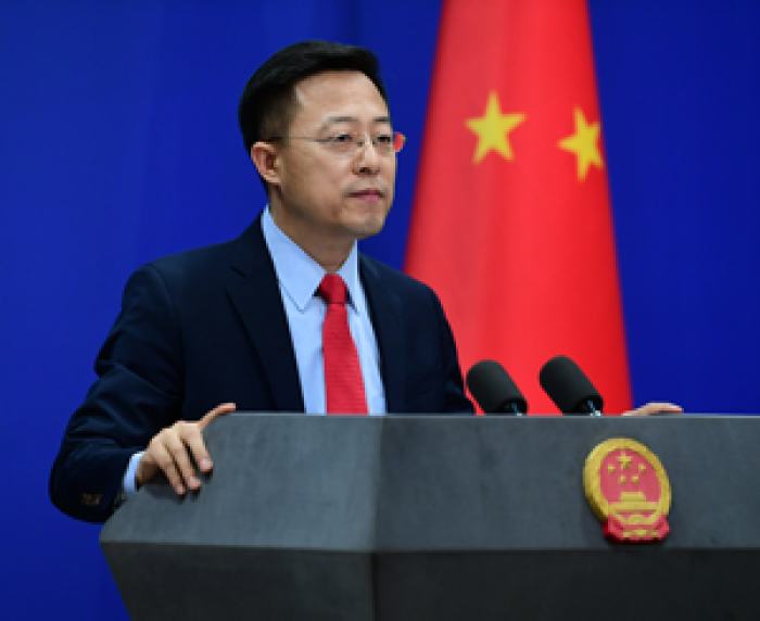 赵立坚“呵呵！”上热搜 这个词怎么翻译？