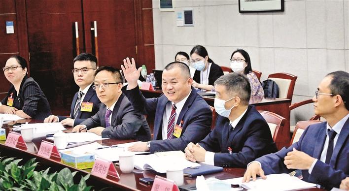 第九讨论组（燕罗街道）热议区政协常委会工作报告  夯实基础设施建设 打造民生幸福城区