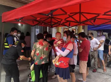 将围社区党委副书记麦卫连“铿锵玫瑰 不负韶华”