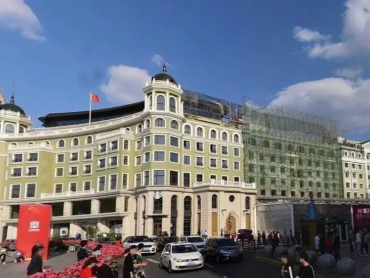 哈尔滨一酒店从6层变9层，被认定违建却拆不了？