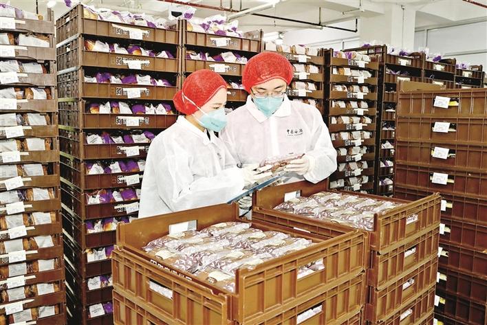 春节传统美食热销  宝安出口蛋卷等年货食品175吨