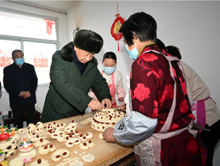 新华社记者说 | 与人民在一起 习近平十年新春暖心故事