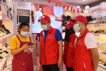 公明社区扬起“光明虹”旗帜 同心助力健康守护“红色”行动