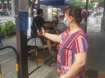 公明街道巧借疫情防控场所码开展防诈宣传