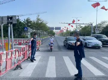 节日我在岗｜公明街道全力保障辖区群众出行交通安全