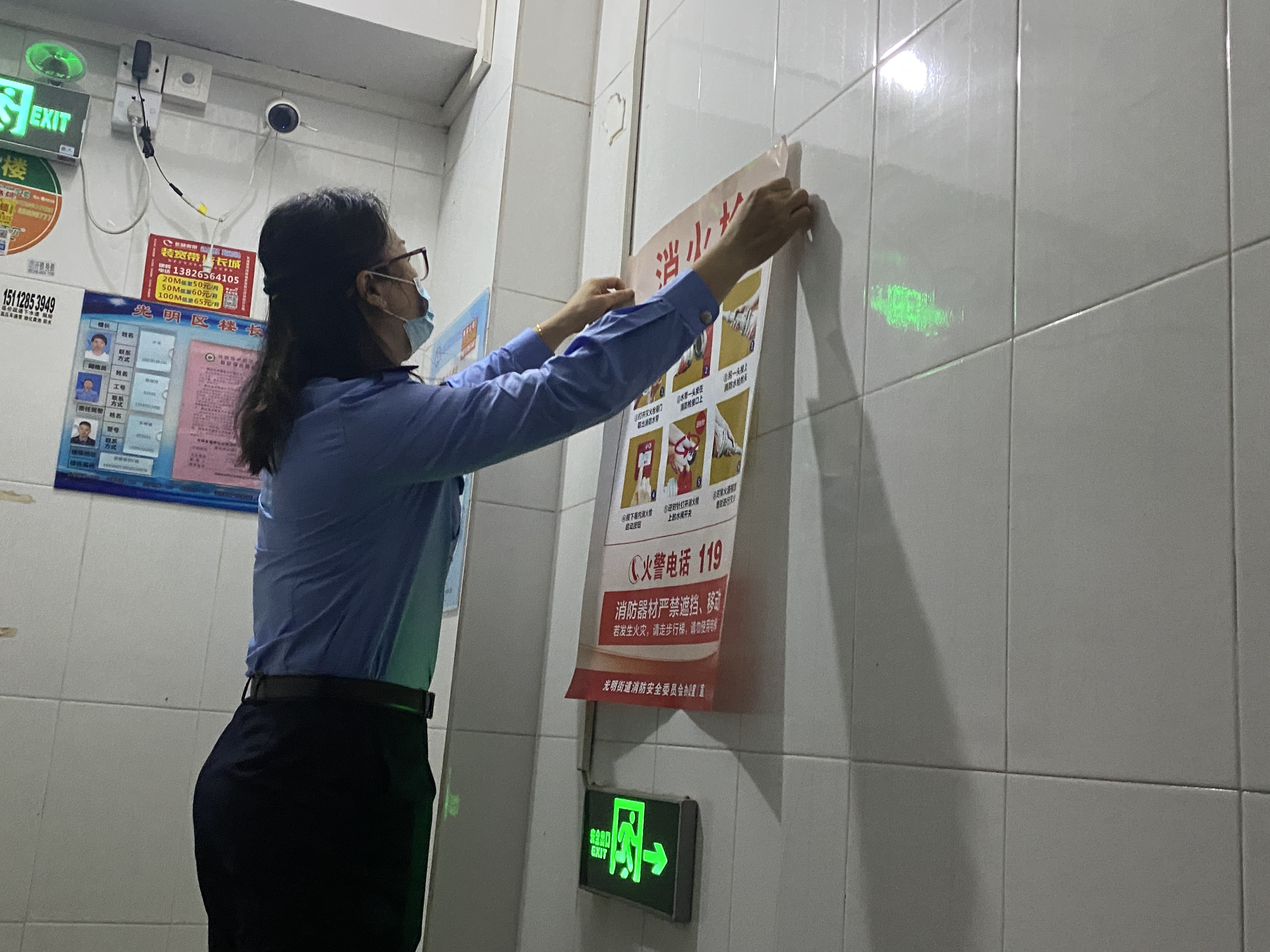 光明街道网格员开展“119”消防安全宣传月活动