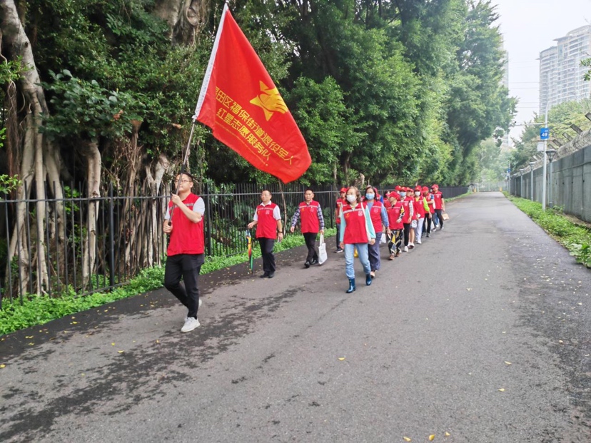 福保街道开展志愿服务环境卫生主题党日活动