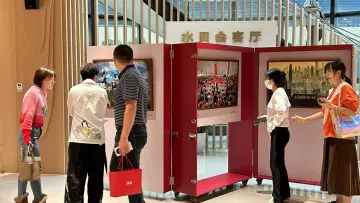 “奋进新时代，向先进模范学习”摄影展首展开幕