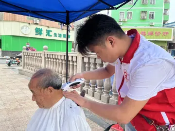 幸福从“头”开始 马田街道石围社区开展义剪便民活动