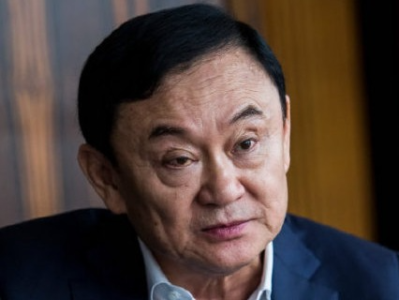 泰国前总理他信被特赦 刑期减轻至一年