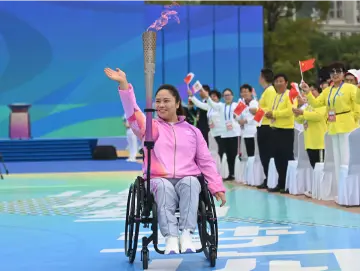 杭州亚残运会火炬传递圆满成功