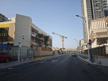 马田街道新庄社区：坑洼道路换新颜，居民出行不再难