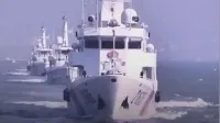 菲律宾船只侵闯黄岩岛邻近海域 中国海警依法驱离 