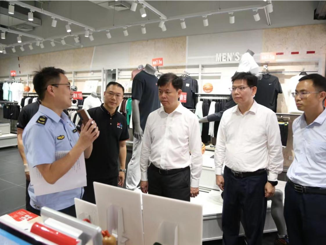 龙岗区举办“预付无忧”商圈建设工作现场会