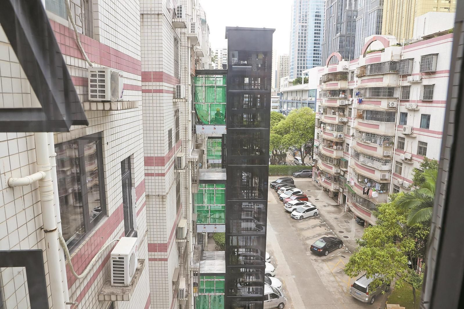 是否装电梯居民意见不统一怎么办？龙城街道找到破解“密码”实现加装率全市第一