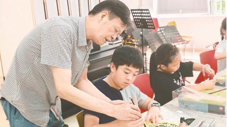 民治街道“兰亭书社”志愿服务队用行动关爱下一代成长