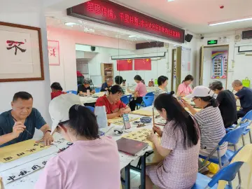 木头龙社区开展中秋书法主题活动