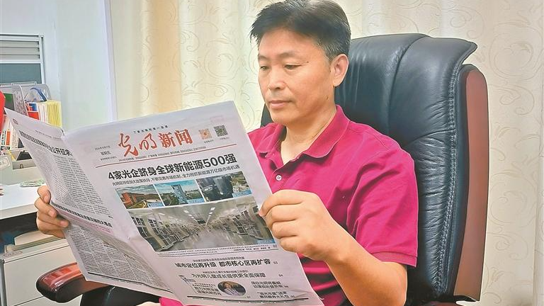 每天阅读让他对光明区有了更深认识
